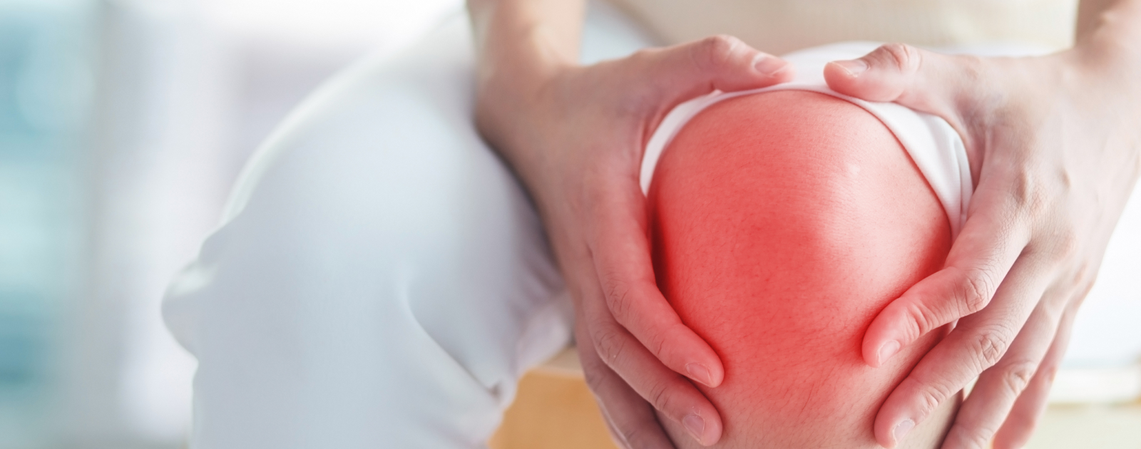 líquido no joelho sintomas